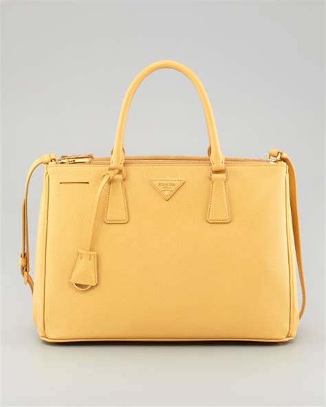 prada yellow purse.